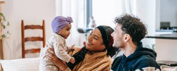 Family With Baby Home Happy